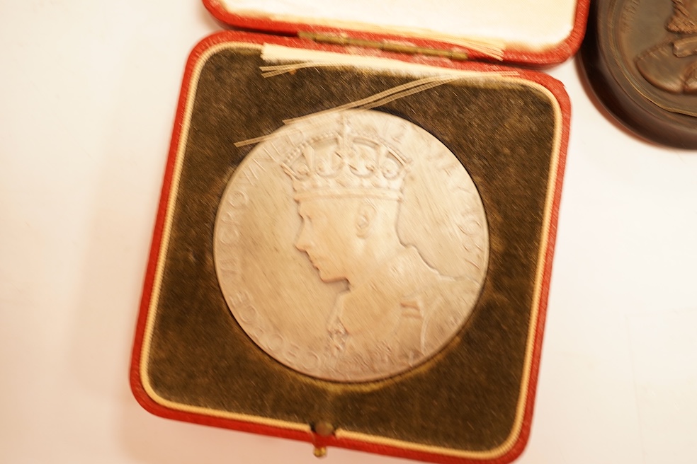 British Medals, to include George VI Matt Silver Coronation medal, cased, George V silver jubilee medal, boxed, Uppingham School silver medal for good work and unblemished character, cased and various coins etc.